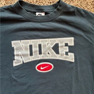 NikeWomen’s Blue Graphic Logo T-Shirt - Nike